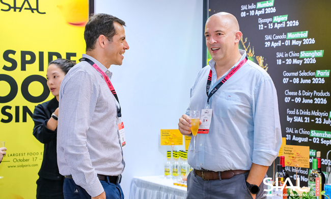Exhibitors networking and discussing food business at SIAL in Shanghai 2026