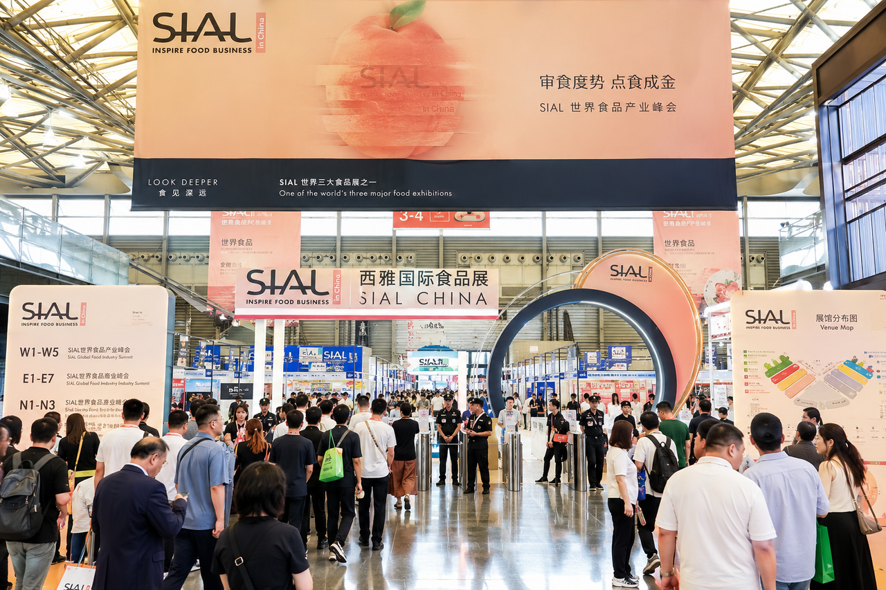 Visitors exploring food industry exhibits at the SIAL Guangzhou international trade show