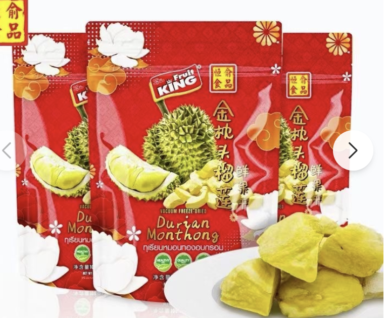 Fruit KING vacuum freeze-dried Durian Monthong in red pouches with a white plate of durian pieces